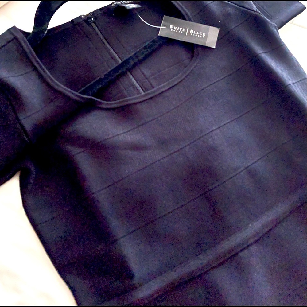 New with tags black dress! Ready for shipping immediately!